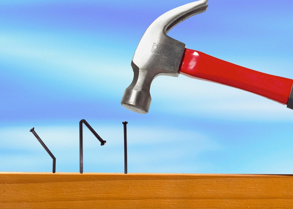 Bent nails. Making mistakes and correcting them